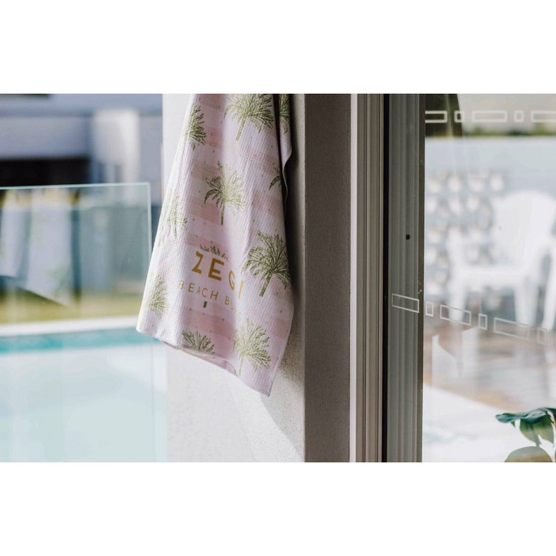 Our Moroccan Palm Quick Dry Towel is perfect for your pool days